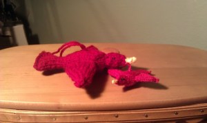 Full size and original tiny red bird for comparison.