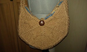 Being modeled by my new dress form no less!