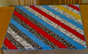 And I made one for Ben's giftee too. He helped with the layout, and even ironed once!