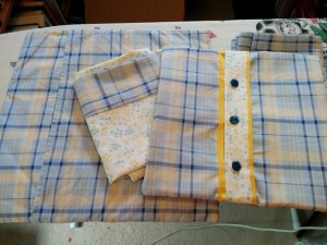 Smaller pillow features my first ever button holes on my sewing machine too!