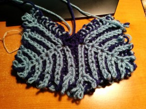 Size 10 needles and worsted aught to do it...