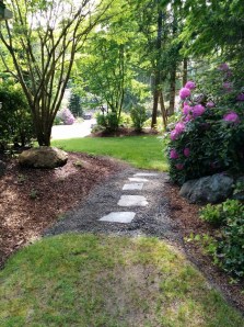 My porch is just to the left.  I've spent a wee bit of time out there enjoying the flowers while knitting a bit this month too.