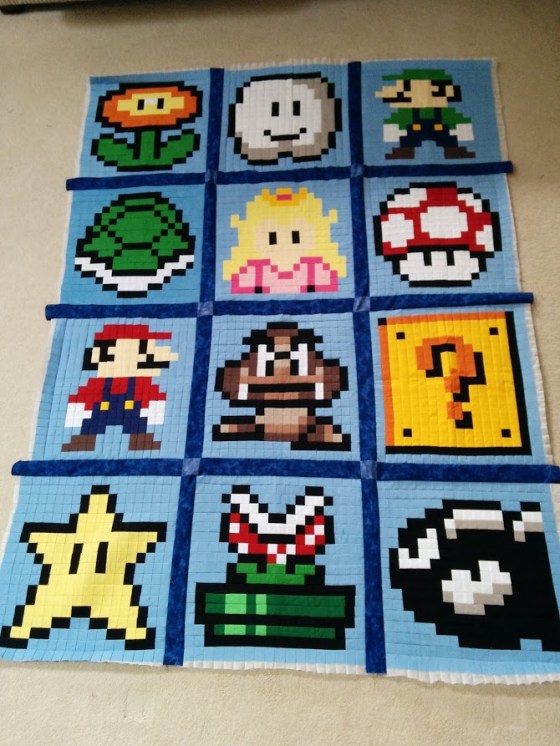 This also needs ironed... but I am also planning to do a bit of a border and I needed to lay it out to calculate the math.