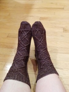 Sock one on the right, all size 0 needle, Sock Two starts with a size 1 needle on the leg.